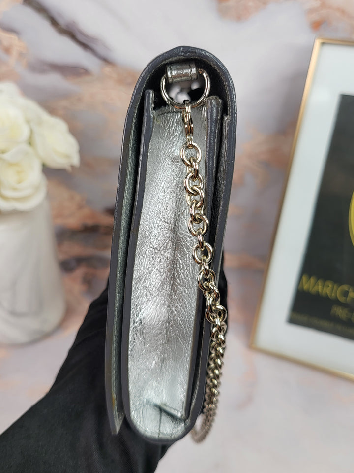 Saint Laurent Silver Metallic Clutch On Chain