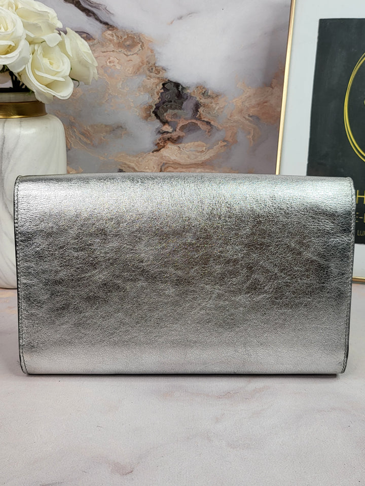 Saint Laurent Silver Metallic Clutch On Chain