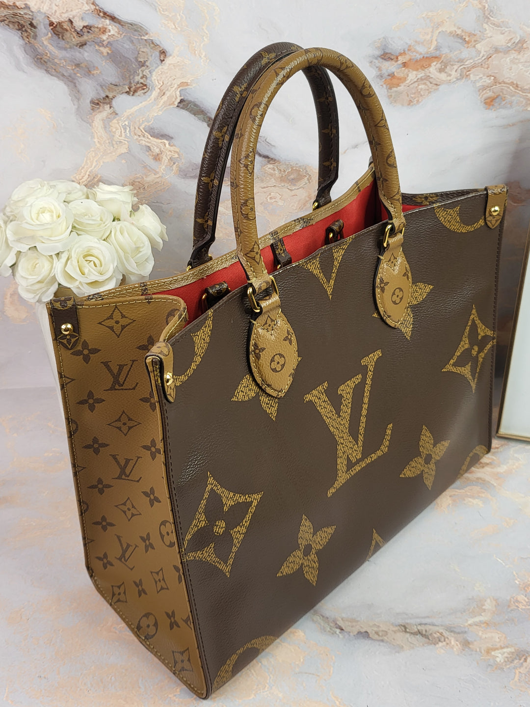 Louis Vuitton Reversed Monogram On The Go MM (OTG)