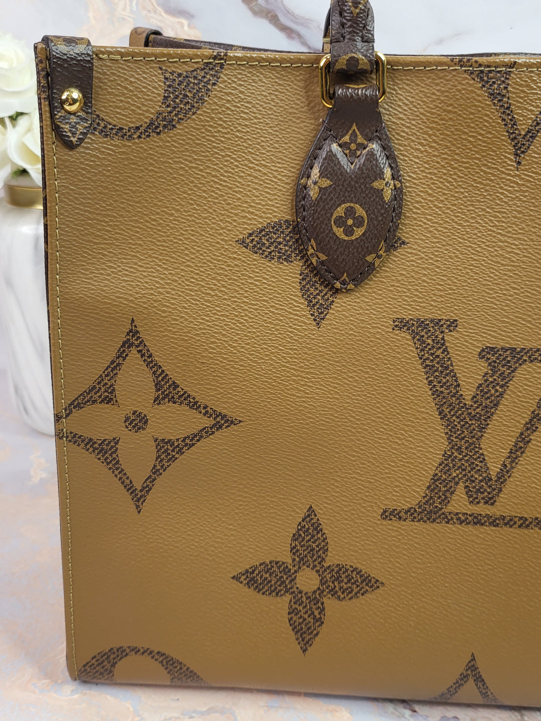 Louis Vuitton Reversed Monogram On The Go MM (OTG)