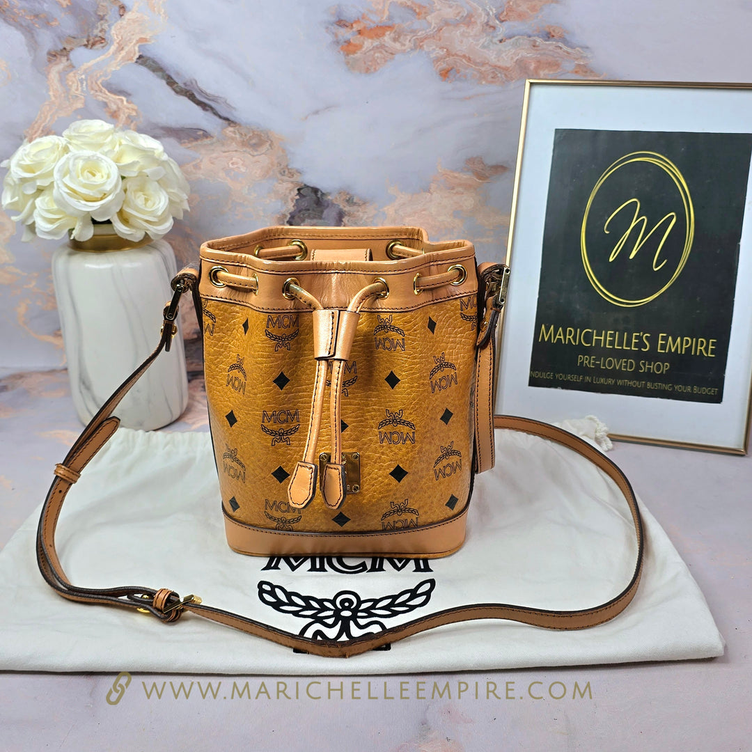 MCM Cognac Drawstring Small Bucket Bag – Marichelle's Empire