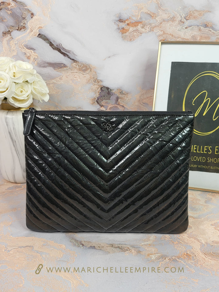 Chanel Patent Calfskin Chevron O Case Clutch