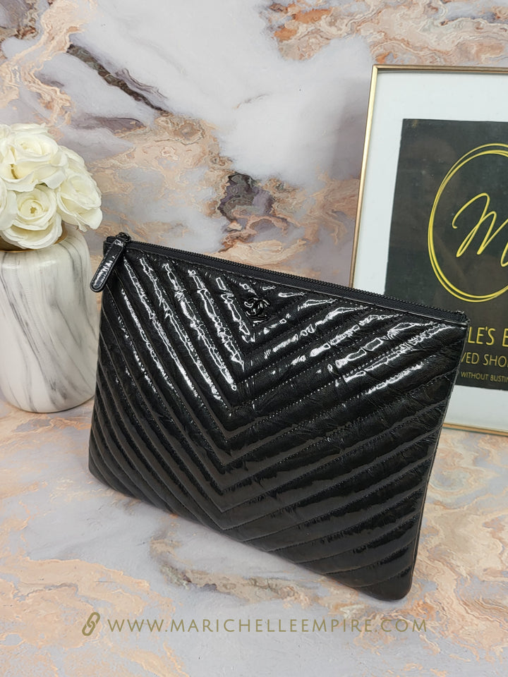 Chanel Patent Calfskin Chevron O Case Clutch