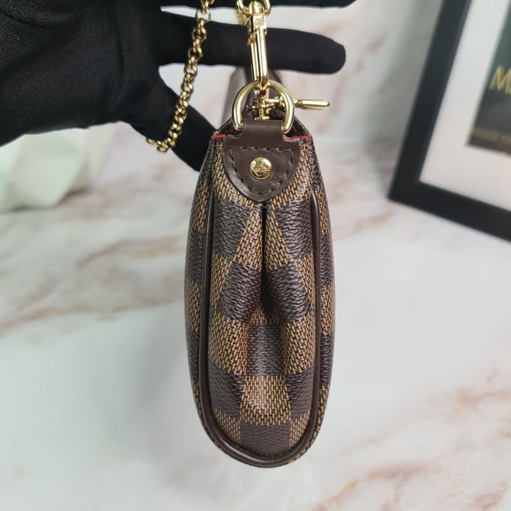 LOUISVUITTON Ebene Eva Clutch - Marichelle's Empire 